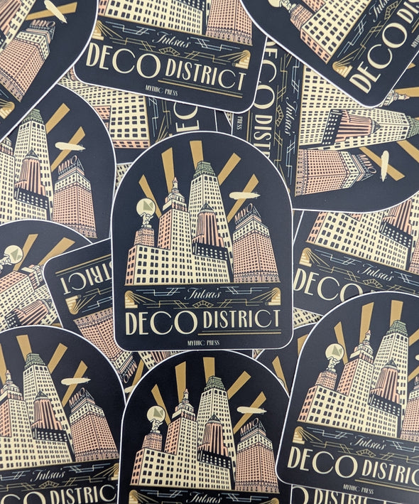 Sticker design of Deco District with architectural elements and 'Deco District' text.