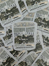 Stickers with Black Wall Street and Greenwood District text and graphics on a white background