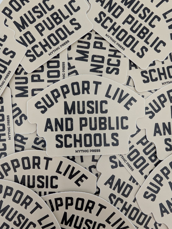 Stickers with 'Support Live Music and Public Schools' text on a beige background