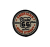 Round patch with 'America's Route 66 Main Street Mythic' text on a white background