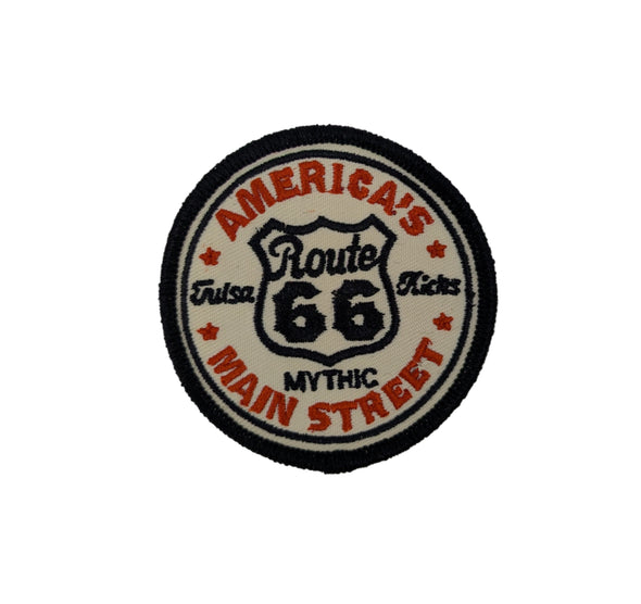 Round patch with 'America's Route 66 Main Street Mythic' text on a white background